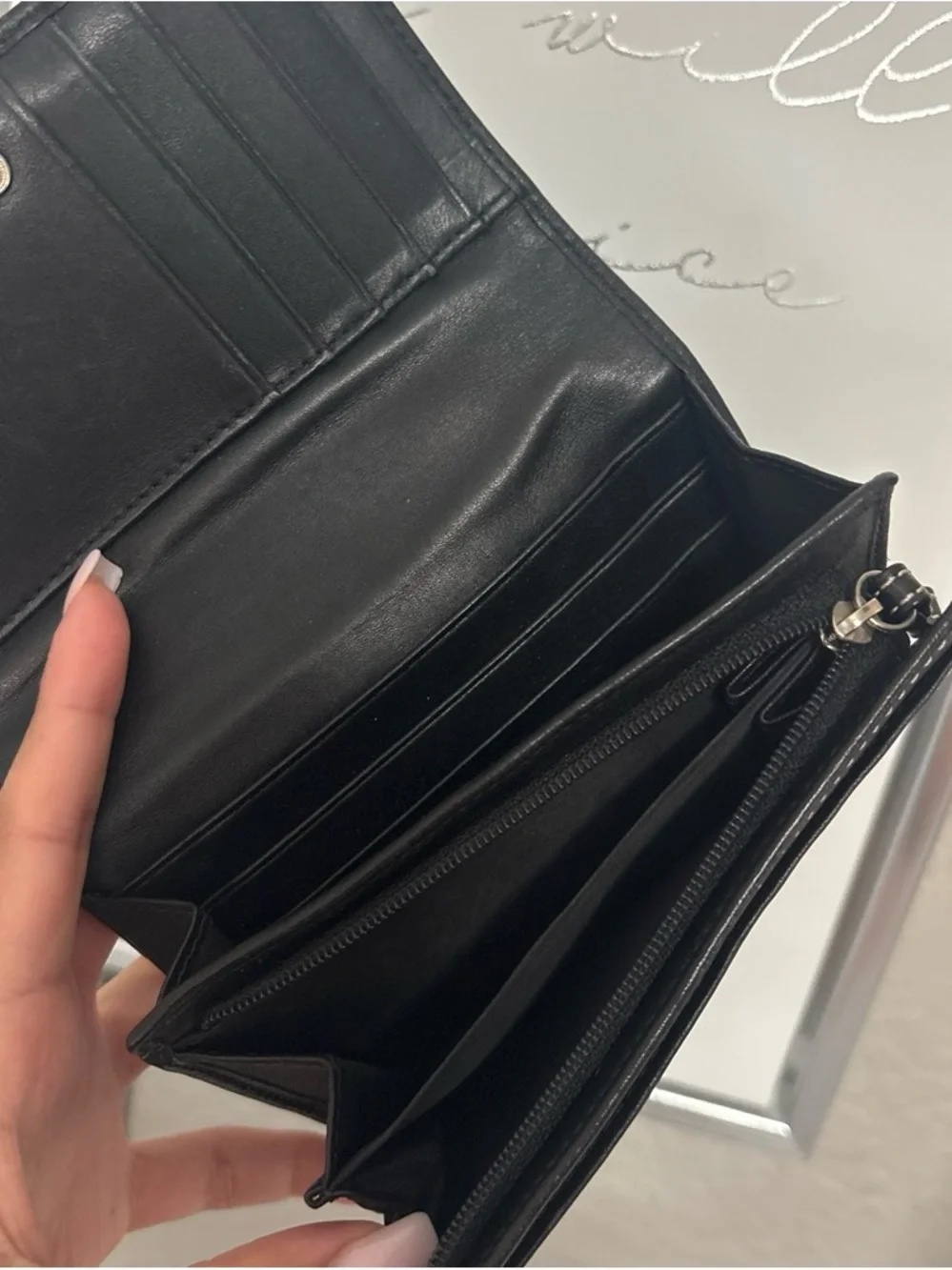 Coach Black Leather Wallet with Silver Buckle